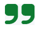 Green quotation mark symbol on a white background.