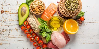 Healthy foods arranged in a heart shape.