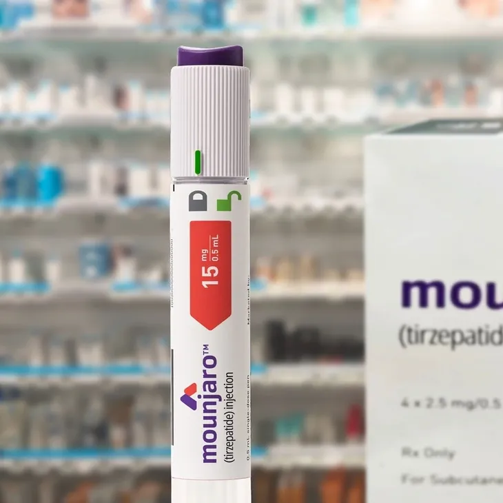 Injection pen and box on blurred background.
